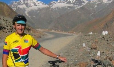 Kenneth Carden Cycling on the  tour with redspokes